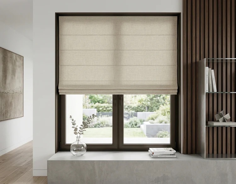 Sombra Roman shade with elegant linen fabric in a modern interior with dark cassette frame — Boise Blinds