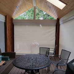 Cozy patio with furniture and retractable blinds