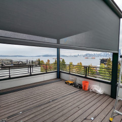 Patio with city skyline and ocean view.