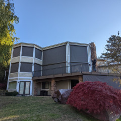 Modern house with large windows and balcony