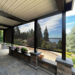 Patio with scenic forest and lake view