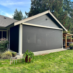 Patio with screened enclosure and plants